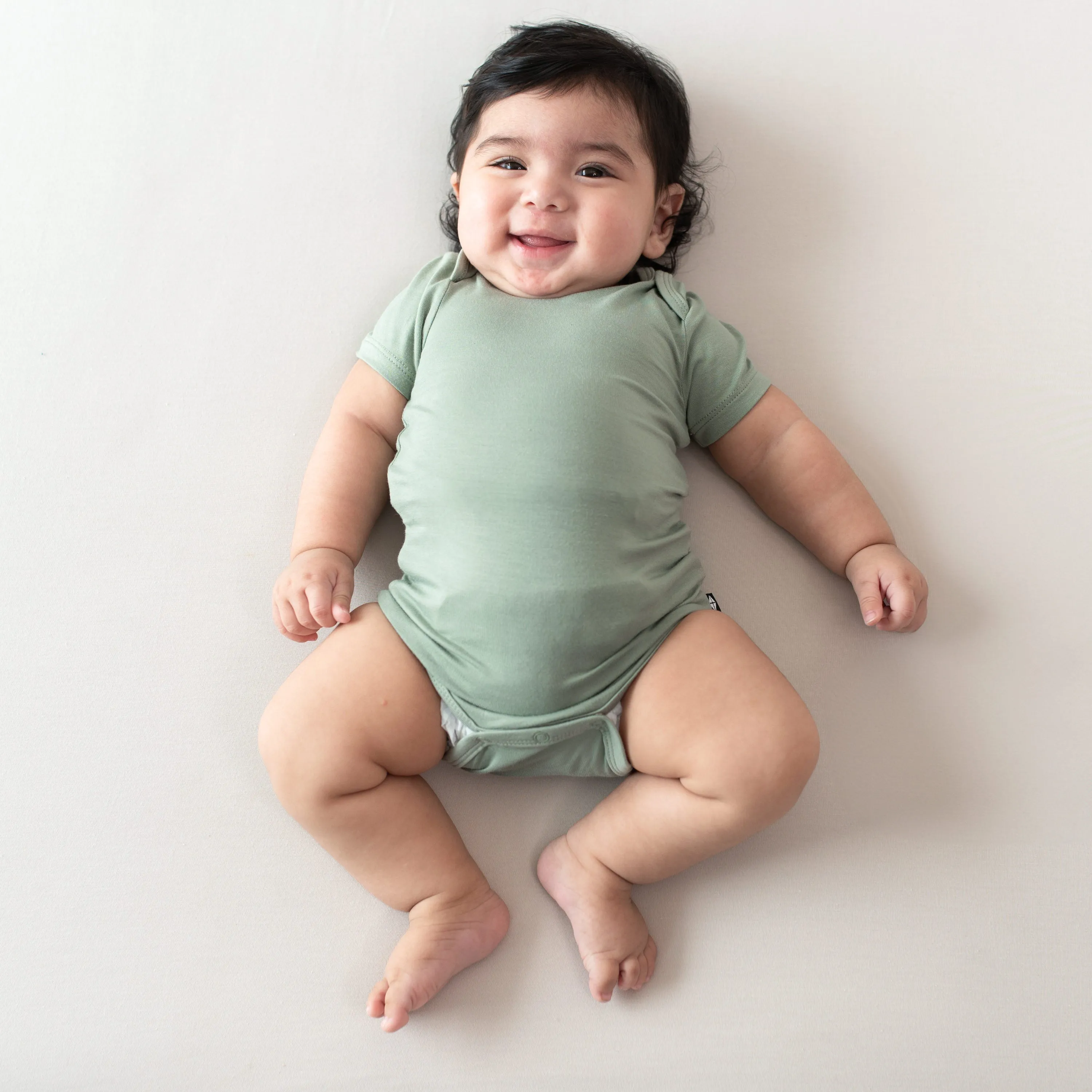 Kyte Baby Long Sleeve Bodysuit (Thyme)